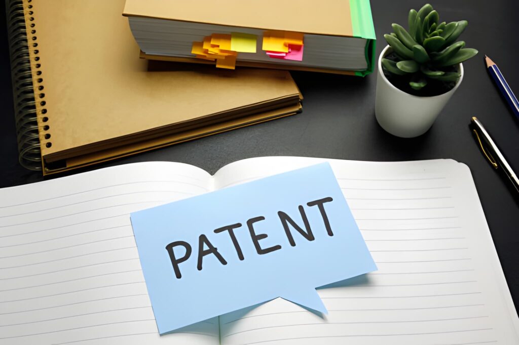 An open notebook with a blue speech bubble saying "PATENT" next to text explaining that India has no provision for Patent Term Extension (PTE), keeping a strict 20-year limit despite regulatory hurdles.
