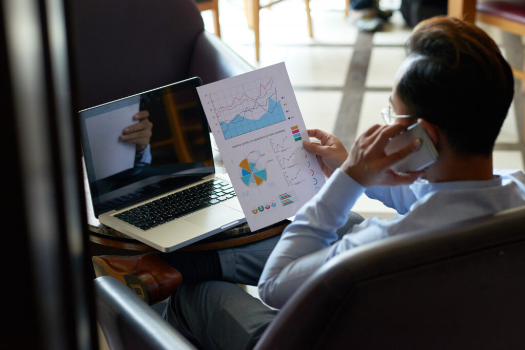 Do Market Research" next to a photo of a businessman sitting in an armchair